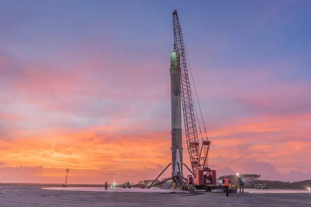 orange and white tower crane photo - Photo by SpaceX on Unsplash
